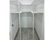 This walk-in closet offers great organization and storage at 992 Shockney Dr, Ormond Beach, FL 32174