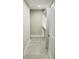 Walk-in closet features modern shelving, recessed lighting and neutral decor at 992 Shockney Dr, Ormond Beach, FL 32174