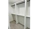 Custom closet with shelving and black rods for optimal storage at 992 Shockney Dr, Ormond Beach, FL 32174