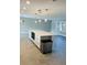 This spacious kitchen island has stainless steel appliances and great storage at 992 Shockney Dr, Ormond Beach, FL 32174