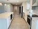 Contemporary kitchen showcasing stainless steel appliances, a convenient island, and stylish recessed lighting at 992 Shockney Dr, Ormond Beach, FL 32174