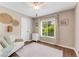 Cozy bedroom with a window and neutral decor, perfect for relaxation and rest at 1719 Anniston Ave, Daytona Beach, FL 32117