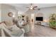Open living space boasting wood-look floors, neutral decor, and ample natural light at 1719 Anniston Ave, Daytona Beach, FL 32117
