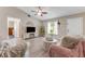 Airy living room featuring wood-look floors, neutral colors, and a cozy atmosphere at 1719 Anniston Ave, Daytona Beach, FL 32117