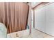 Well-maintained bathroom with bathtub, neutral tile floor, and double-door closet at 2270 Wilmhurst Rd, Deland, FL 32720
