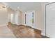 Bright foyer with hardwood floors, a vaulted ceiling, and a stylish front door at 2270 Wilmhurst Rd, Deland, FL 32720