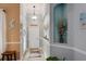 Bright hallway featuring neutral paint colors and decorative nooks at 3160 Bailey Ann Dr, Ormond Beach, FL 32174
