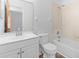 Clean bathroom with a vanity, toilet, and shower-tub combo at 7686 Sw 81St St, Ocala, FL 34476