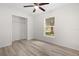 Bright bedroom featuring a ceiling fan and a closet at 7686 Sw 81St St, Ocala, FL 34476