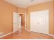 Bedroom featuring hardwood floors and a closet for ample storage at 902 Heron Point Cir, Deland, FL 32724