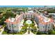 Aerial view of the complex showing its prime location near the ocean, golf course, and beautifully landscaped grounds at 1 John Anderson Dr # 2180, Ormond Beach, FL 32176