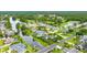 A distant aerial view of a neighborhood on a large river at 101 Green Heron Ct, Daytona Beach, FL 32119