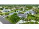 Aerial view of a lovely home surrounded by mature trees and overlooking a tranquil waterway at 101 Green Heron Ct, Daytona Beach, FL 32119