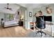 Relaxing bedroom and bonus room featuring a bed and workspace with natural light at 101 Green Heron Ct, Daytona Beach, FL 32119