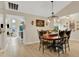 Charming dining room features a wooden table with seating for six and modern decor at 101 Green Heron Ct, Daytona Beach, FL 32119