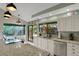 Bright kitchen featuring granite countertops, stainless steel appliances, and ample counterspace at 101 Green Heron Ct, Daytona Beach, FL 32119