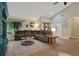 Comfortable living room featuring cozy sectional sofa, neutral colors, and lots of natural light at 101 Green Heron Ct, Daytona Beach, FL 32119
