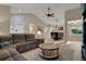 Spacious living room with ceiling fan, comfortable seating, and plenty of natural light at 101 Green Heron Ct, Daytona Beach, FL 32119