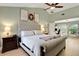 The primary bedroom boasts vaulted ceilings, hardwood floors, and a tranquil ambiance at 101 Green Heron Ct, Daytona Beach, FL 32119
