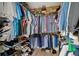Spacious walk-in closet providing ample storage with shelving and hanging racks for clothing and accessories at 101 Green Heron Ct, Daytona Beach, FL 32119