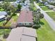 Aerial view of the home showcasing the roof, yard, and surrounding neighborhood at 106 Banyan Dr, Ormond Beach, FL 32176