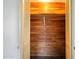 Walk-in closet with wood paneling and ample hanging space at 106 Banyan Dr, Ormond Beach, FL 32176