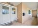 Charming front entrance featuring double doors, mailbox, and small table at 106 Banyan Dr, Ormond Beach, FL 32176