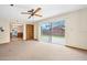 Open concept living room with sliding doors to the backyard patio at 106 Banyan Dr, Ormond Beach, FL 32176