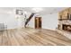 Large living area with a fireplace, staircase and an open floor plan at 12 Big Buck Trl, Ormond Beach, FL 32174