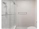 Modern shower with glass doors and a sleek fixture at 12 Big Buck Trl, Ormond Beach, FL 32174