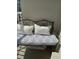 Comfortable metal balcony bench with decorative cushions for outdoor relaxation at 1233 S Atlantic Ave # 3070, Daytona Beach, FL 32118