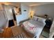 Inviting bedroom featuring a bright coastal design and warm wood-look floors at 1233 S Atlantic Ave # 3070, Daytona Beach, FL 32118