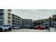 Condominium complex featuring multiple floors, balconies, and a parking area at 1233 S Atlantic Ave # 3070, Daytona Beach, FL 32118