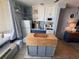 Well-equipped kitchen features updated appliances, ample storage, and functional island at 1233 S Atlantic Ave # 3070, Daytona Beach, FL 32118