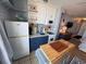 Kitchen showcases a portable island, modern appliances, and efficient layout at 1233 S Atlantic Ave # 3070, Daytona Beach, FL 32118