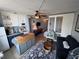 Open living space featuring a charming kitchenette and stylish decor with blue accents throughout the condo at 1233 S Atlantic Ave # 3070, Daytona Beach, FL 32118