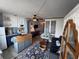 Inviting living space featuring a charming kitchenette and stylish decor with blue accents throughout the condo at 1233 S Atlantic Ave # 3070, Daytona Beach, FL 32118