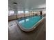 Indoor pool with large windows, providing a bright and enjoyable swimming experience year-round at 1233 S Atlantic Ave # 3070, Daytona Beach, FL 32118