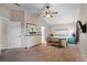 Lovely bedroom boasting a neutral color scheme, a bench at the foot of the bed, and substantial dresser at 25216 Ironwedge Dr, Sorrento, FL 32776