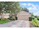 Beautiful single-story home with a two-car garage and meticulously maintained landscaping at 25216 Ironwedge Dr, Sorrento, FL 32776