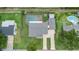Drone shot of backyard pool and yard at 321 Scotland Dr, Daytona Beach, FL 32117