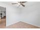 Empty bedroom with tile flooring, ceiling fan, neutral paint, and plenty of natural light at 321 Scotland Dr, Daytona Beach, FL 32117