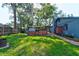 Spacious backyard with lush green grass, wooden fences and a gazebo at 35 Whippoorwill Ln, Ormond Beach, FL 32174