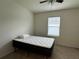 Bedroom featuring neutral paint, carpet floors, and a large window at 551 Shaelyn Pl, Deland, FL 32724