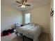Bedroom featuring neutral paint, carpet floors, and a large window at 551 Shaelyn Pl, Deland, FL 32724