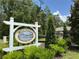Sign for Victoria Oaks community in a natural setting with lush greenery at 551 Shaelyn Pl, Deland, FL 32724