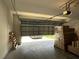 Spacious garage with an automatic door opener and ample room for storage or parking at 551 Shaelyn Pl, Deland, FL 32724