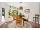 Bright dining area with natural light and decorative rug at 1 Crooked Bridge Way, Ormond Beach, FL 32174