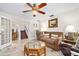 Comfortable living area with easy access to the staircase and dining area, creating a seamless flow throughout the home at 1 Crooked Bridge Way, Ormond Beach, FL 32174