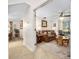 Inviting living room with tile floors and neutral tones, perfect for relaxation and entertaining guests at 1 Crooked Bridge Way, Ormond Beach, FL 32174